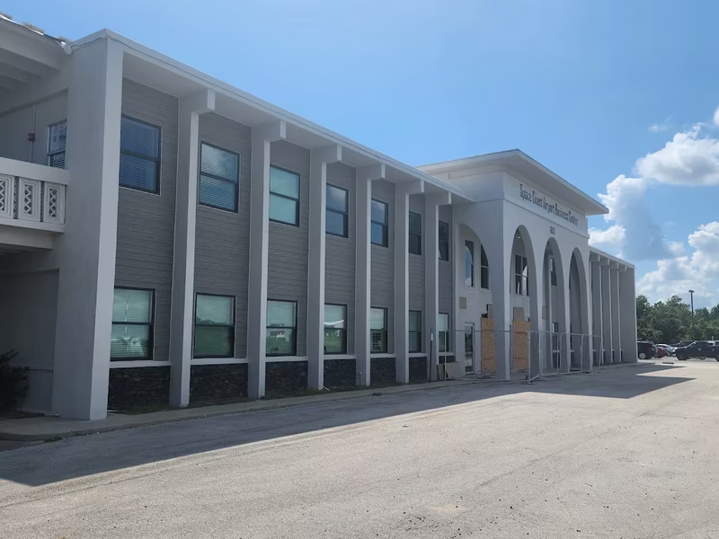 Airport business center commercial exterior painting wide view by RPB Painting