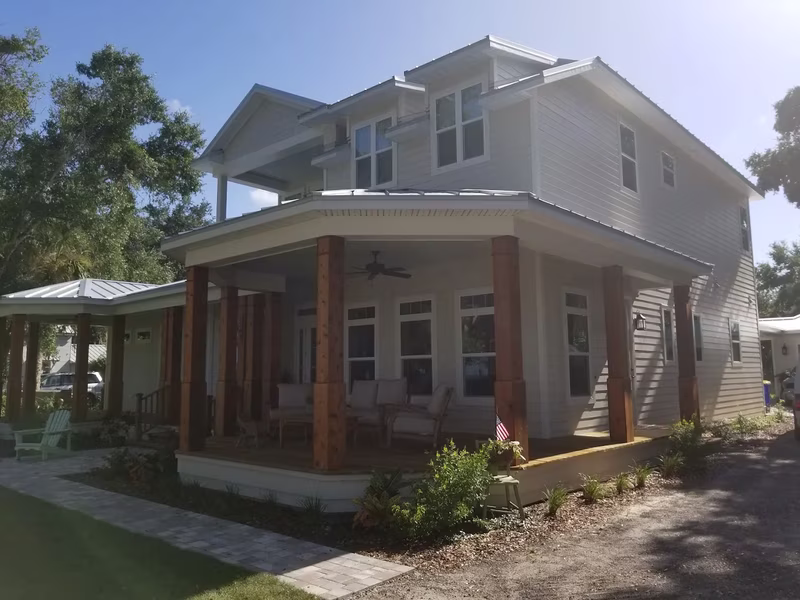 Craftsman home exterior painting with white covered porch by RPB Painting Florida