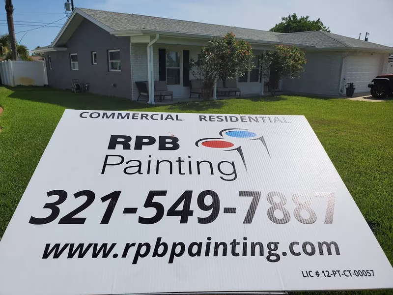 Gray ranch house residential exterior painting by RPB Painting Florida