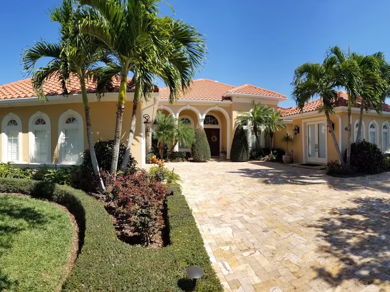 Mediterranean luxury home exterior painting with palm trees by RPB Painting Florida